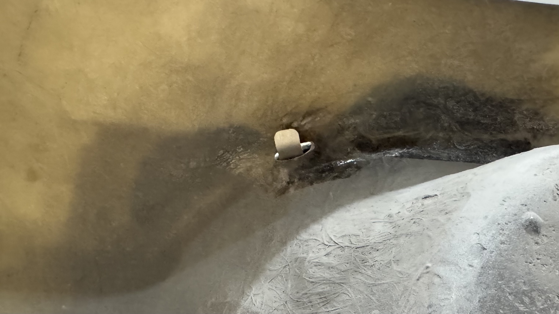 Restoration clip installed in bumper
