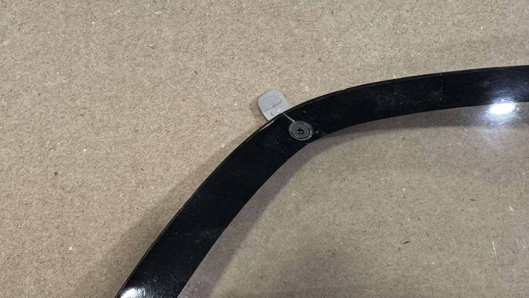Restoration clip installed on lens