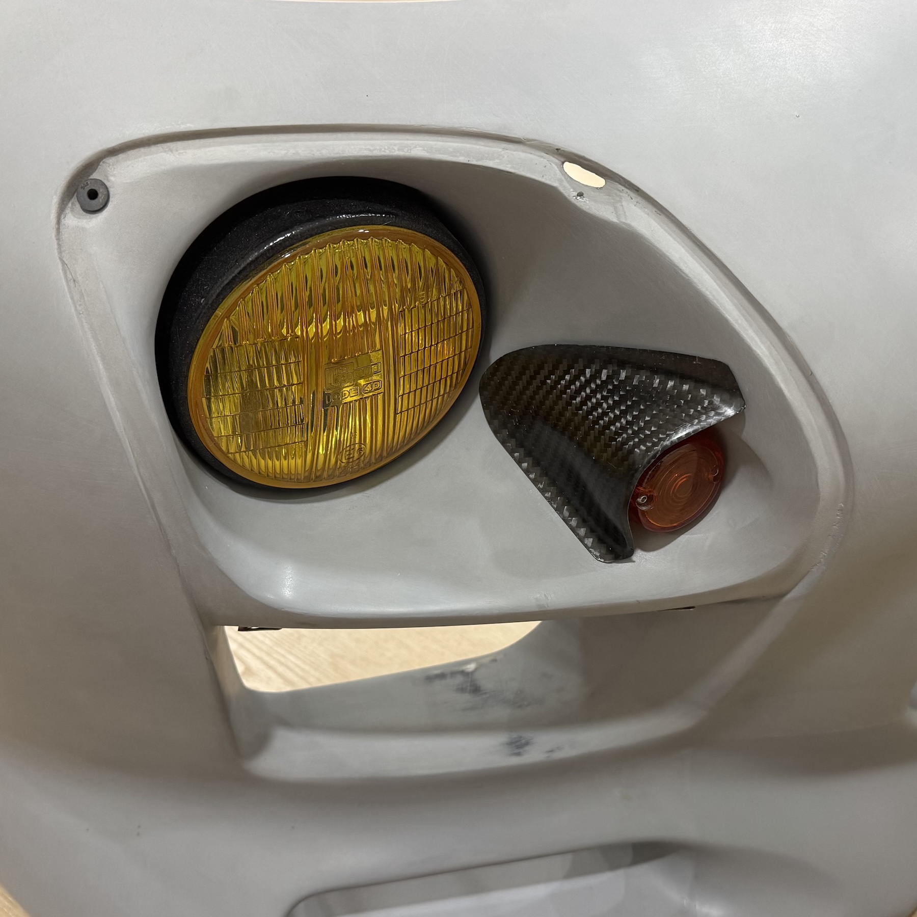 Carbon fiber turn signal shroud